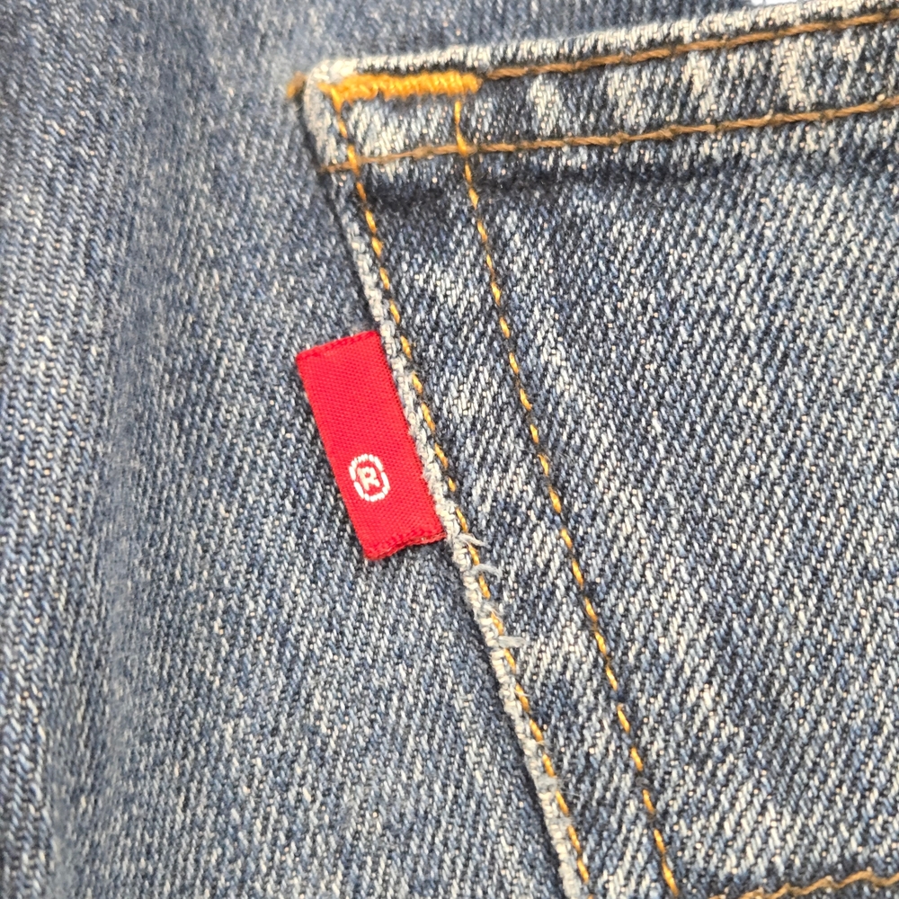Distressed Levi's 527 Blank Red Tab Denim Blue Jeans